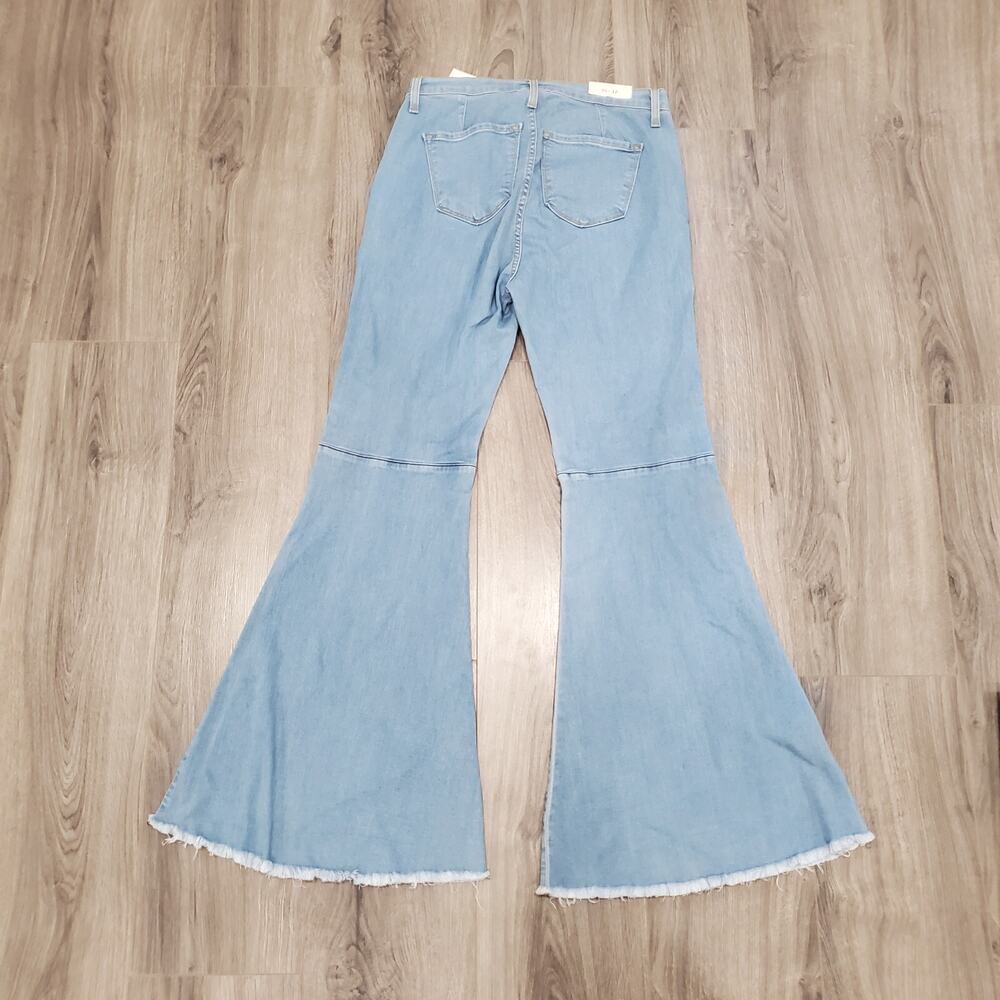 #466. Judy Blue Light Wash Flare Jeans with Raw Hem. - Picture 2 of 7
